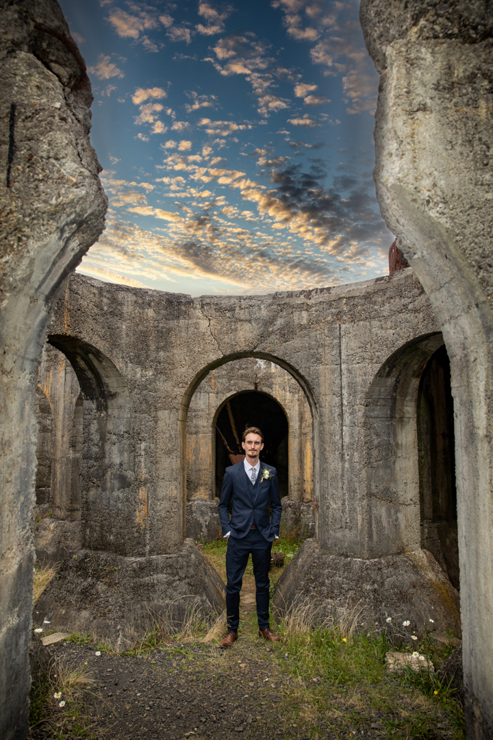 Groom with dramatic sky